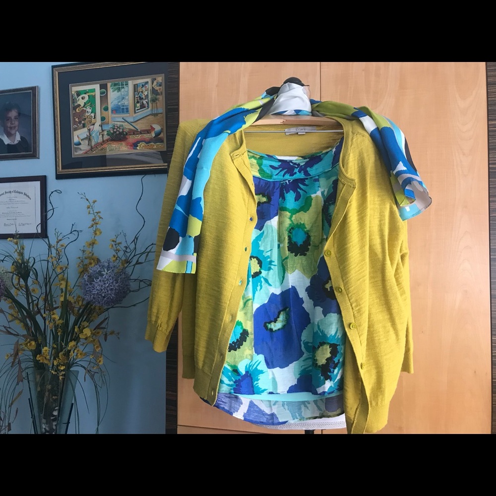 A set of cardigan, skirt and scarf